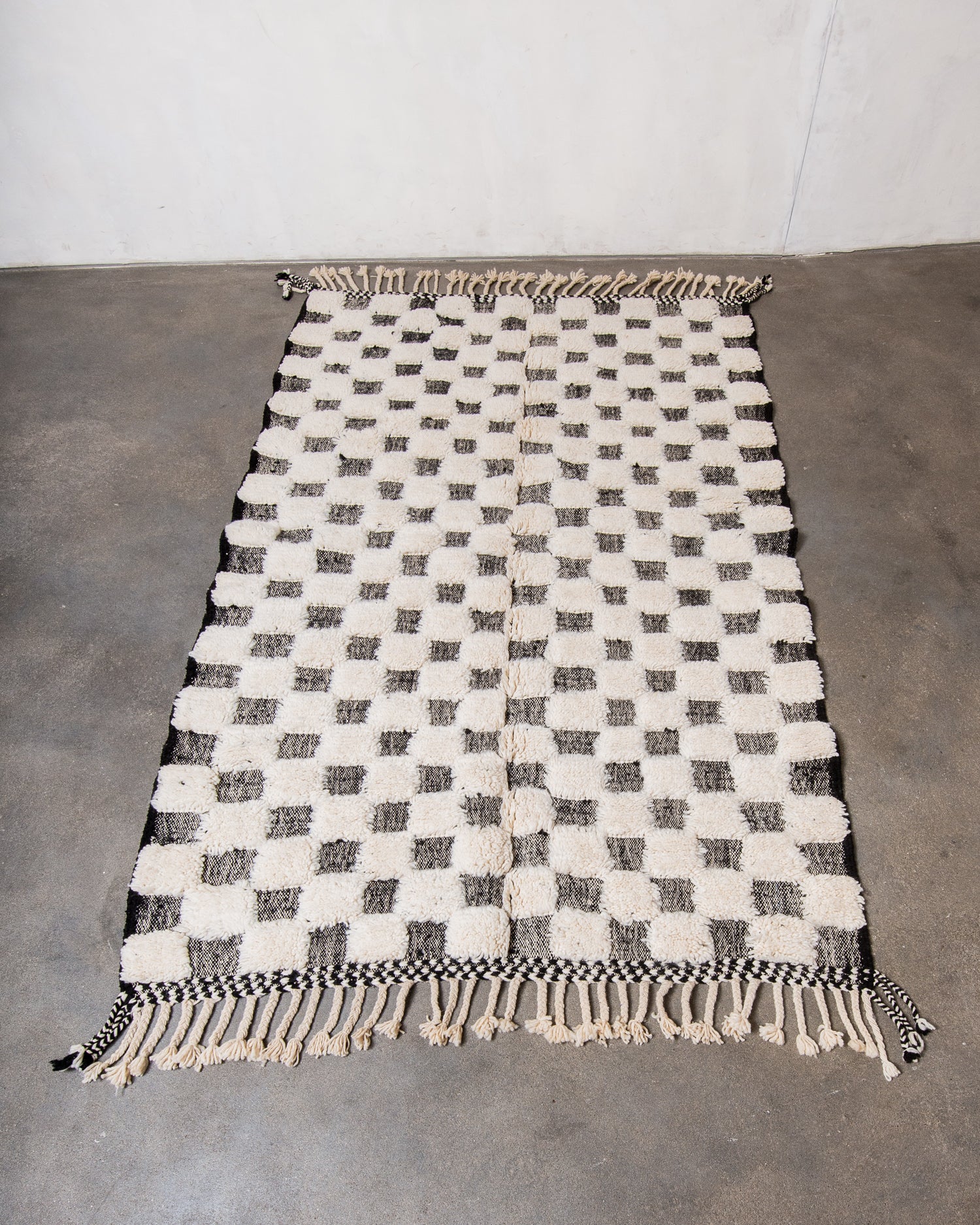 Modern, designer, handcrafted Berber rug from Morocco. Beniourain carpet with minimalist design, natural wool pile and a fluffy texture.
